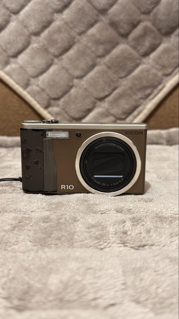 Ricoh R10 Negotiable (Category: Cameras) located in Manila. Submitted by decluttersss (Listing ID 1459498180, Image 1). Description: Selling Ricoh R10 unit and battery only. Battery pala is a replacement lang from orange app. Meetup so you can test it. If want niyo lalamove/grab, payment upfront..
