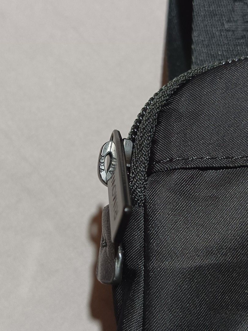 Rimowa nylon harness backpack (Category: Backpacks) located in Davao. Submitted by hisdef (Listing ID 1459617501, Image 3). Description: rimowa nylon harness backpack Condition- lightly used issue- see 9th and 10th slides no inclusion Dimensions in inches width-12 length-14.5.