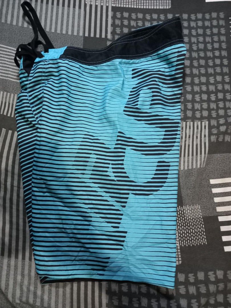 Rip Curl Board Shorts Size 30 Blue Black Stripe (Category: Swim Trunks & Board Shorts) located in Panabo. Submitted by khimmyirish_ki021126 (Listing ID 1459551039, Image 3). Description: - Rip Curl board shorts - Size 30 - Blue and black stripe pattern - Back pocket with zip closure - Drawstring waist - Ideal for swimming or surfing.