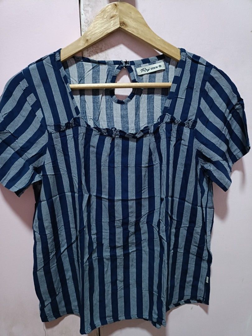 Rize Denim Striped Square Neck Top (Category: Sleeveless) located in Malabon City. Submitted by coollion.15fe1d (Listing ID 1459654570, Image 3). Description: - Cute Rize Denim top - Navy and white stripes - Square neckline with ruffled detail - Short sleeves - Keyhole back opening with button closure - Lightweight fabric - Great for casual wear.