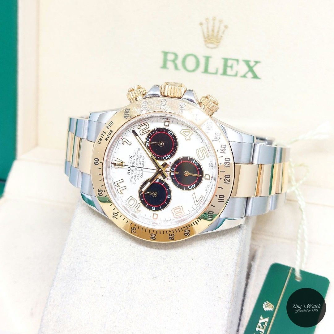 Rolex 40mm 18K Half YG Panda Dial Cosmograph Daytona REF: 116523 (Box, Cert & Serial Tag-2013) (Category: Watches) located in Singapore. Submitted by pngwatchdealer (Listing ID 1459671518, Image 2). Description: [SPECIFICATIONS] **Watch comes with full option (Box, Cert & Serial Tag)** **Straight bracelet** Brand: Rolex Model: Oyster Perpetual 40mm Panda Dial Daytona (REF: 116523)(AN)(13)(O) Movement: Automatic (Self-Winding) Functions and Featur