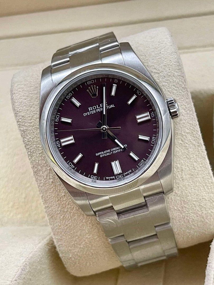 Rolex Oyster Perpetual Automatic Watch (Category: Luxury Watches) located in Manila. Submitted by watchesbyjamesdy (Listing ID 1459529291, Image 2). Description: - Rolex Oyster Perpetual Watch - Automatic Movement - Stainless Steel Case and Bracelet - Stunning Deep Purple Dial - Classic and Versatile Design - Perfect for Everyday Wear - Includes Original Box.