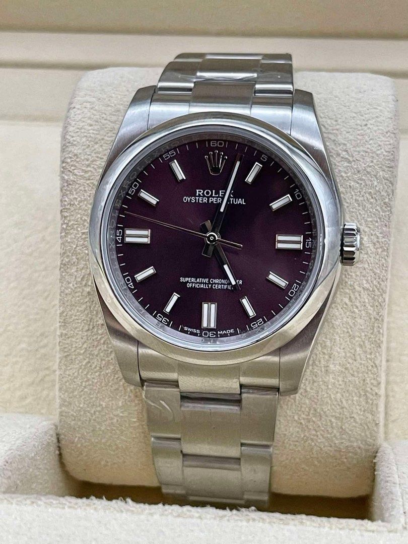 Rolex Oyster Perpetual Automatic Watch (Category: Luxury Watches) located in Manila. Submitted by watchesbyjamesdy (Listing ID 1459529291, Image 1). Description: - Rolex Oyster Perpetual Watch - Automatic Movement - Stainless Steel Case and Bracelet - Stunning Deep Purple Dial - Classic and Versatile Design - Perfect for Everyday Wear - Includes Original Box.