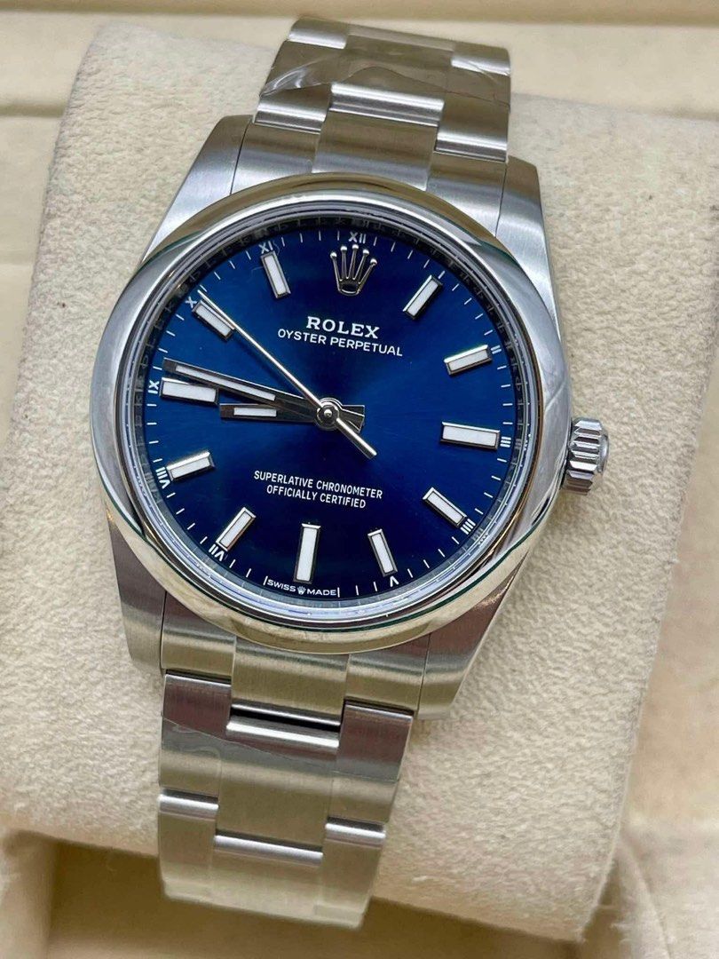 Rolex Oyster Perpetual Blue Dial Automatic Watch (Category: Luxury Watches) located in Manila. Submitted by watchesbyjamesdy (Listing ID 1459528214, Image 2). Description: - Rolex Oyster Perpetual - Stunning blue dial - Superlative Chronometer Officially Certified - Swiss Made craftsmanship - Reliable automatic movement - Durable stainless steel case and bracelet - Rolex crown logo on clasp - Protective plastic still on clasp.