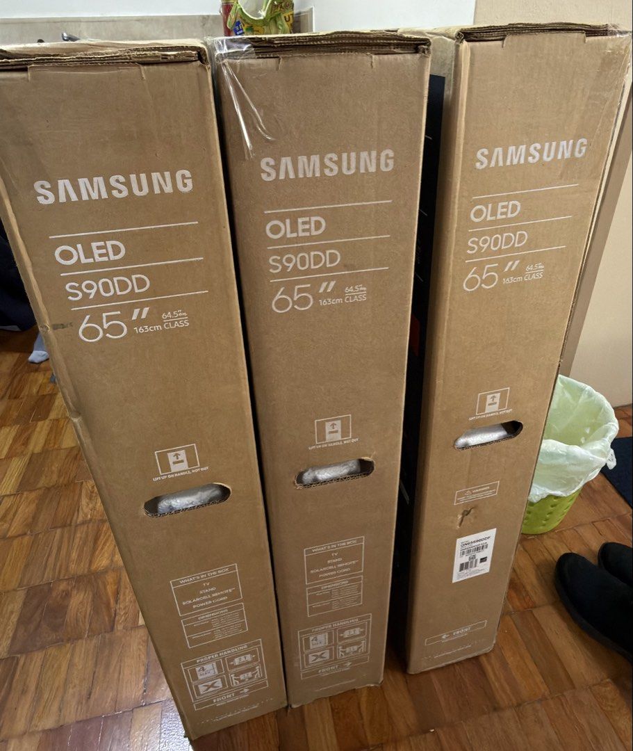 RUSH! New Samsung OLED 65 inch Smart TV (Category: TV) located in Makati City. Submitted by beyond199 (Listing ID 1459641577, Image 3). Description: Hi! I am selling my brand new Samsung S90DD 65 inch OLED Smart TV for 48,995 pesos only. NO SWAPPING. FIXED PRICE. Freebie: New 500w AVR Original price at 90,000 pesos. Selling low. Items are brand new, opened only to test and never used. Complete with original box, remote control, manuals and plasti