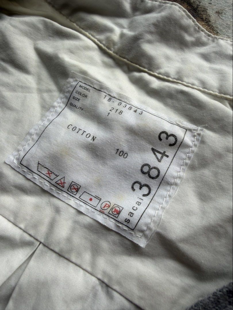 Sacai (Category: Shirts) located in Quezon City. Submitted by macleen17 (Listing ID 1459616321, Image 3). Description: Sacai Size 1 M Excellent Condition White / grey Color Made in China.