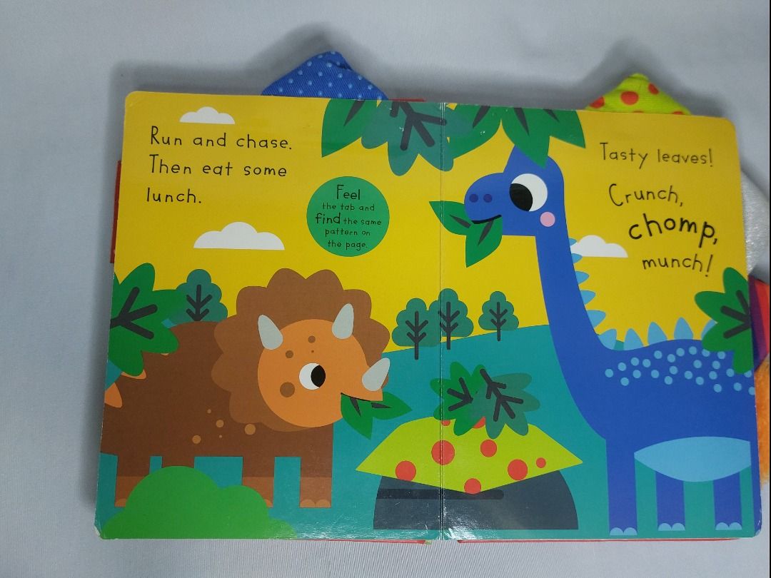 Scholastic Dino's Busy Book Interactive Board Book (Category: Children's Books) located in Paranaque City. Submitted by ca.firstonlinebiz (Listing ID 1459633396, Image 3). Description: Preloved Dino's Busy Book by Scholastic - Interactive soft book for little ones - Features colorful illustrations and simple text - Encourages exploration and learning - Perfect for toddlers and preschoolers - Ideal for story time - Sign of usage Loc. Greenheights 