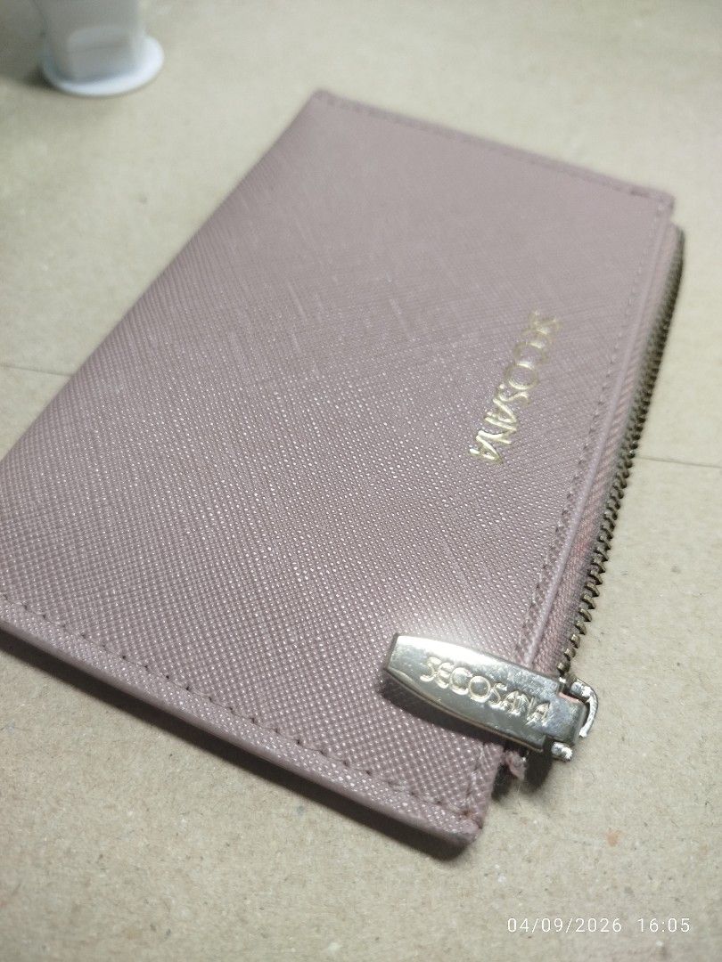 Secosana Card Holder Wallet Muted Pink (Category: Wallets & Card holders) located in Mandaluyong City. Submitted by supersale_mnl (Listing ID 1459567330, Image 2). Description: - Chic pink Secosana card holder - Zippered compartment for coins or small essentials - Multiple card slots for easy access - Compact and practical for everyday organization - Smooth zipper operation - FLAW: yung dalawang top card slots di na magagamit (1 card lang pwede) 