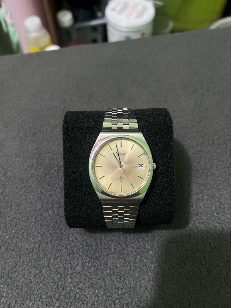 Seiko Quartz Watch Gold Dial Date Window (Category: Luxury Watches) located in Cebu City. Submitted by jbok_watches. (Listing ID 1459634697, Image 1). Description: - Vintage Seiko Quartz watch - Elegant gold dial with date window at 3 o'clock - Durable stainless steel bracelet - Case back model number: 6030-5040 - Requires a new battery - Sold as is.