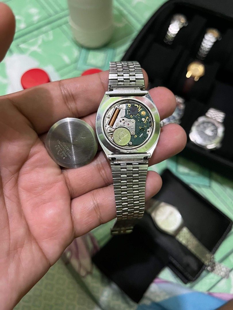 Seiko Quartz Watch Gold Dial Date Window (Category: Luxury Watches) located in Cebu City. Submitted by jbok_watches. (Listing ID 1459634697, Image 3). Description: - Vintage Seiko Quartz watch - Elegant gold dial with date window at 3 o'clock - Durable stainless steel bracelet - Case back model number: 6030-5040 - Requires a new battery - Sold as is.
