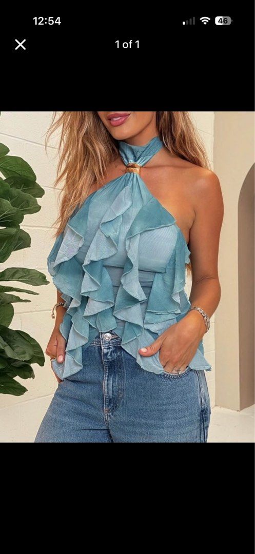 shein blue sleeveless ruffled top XS (Category: Sleeveless) located in Quezon City. Submitted by shopby_a (Listing ID 1459533299, Image 1). Description: .