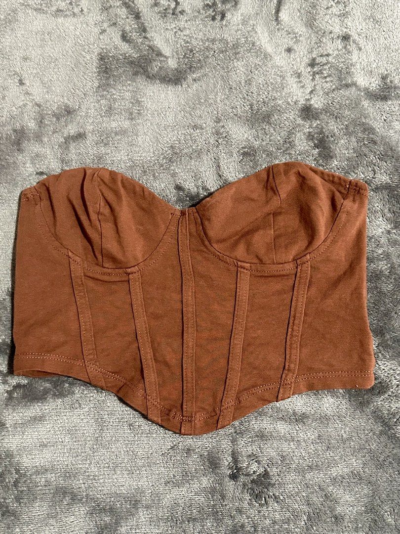 SHEIN Brown Corset Bustier Top XS (Category: Sleeveless) located in Cebu City. Submitted by ann_4 (Listing ID 1459504185, Image 1). Description: Worn only ONCE. Size : XS Price : 100 - Brown corset top from SHEIN - Soft naterial - Boning details for a structured look - Strapless design - Versatile for dressing up or down .