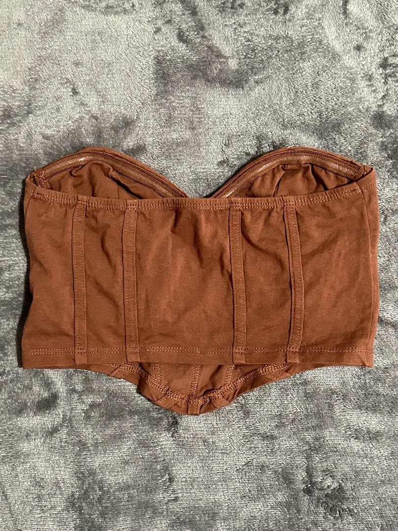 SHEIN Brown Corset Bustier Top XS (Category: Sleeveless) located in Cebu City. Submitted by ann_4 (Listing ID 1459504185, Image 2). Description: Worn only ONCE. Size : XS Price : 100 - Brown corset top from SHEIN - Soft naterial - Boning details for a structured look - Strapless design - Versatile for dressing up or down .