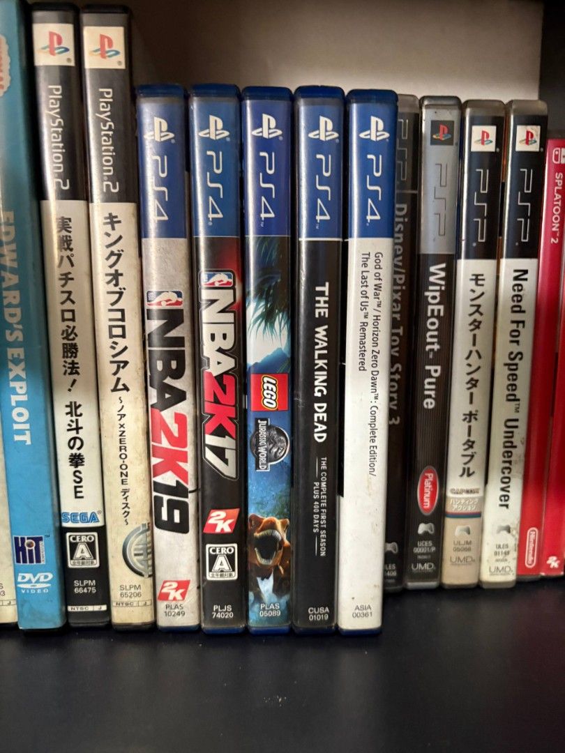 Sony PlayStation 4 Slim Console with Controller and Games (Category: PlayStation) located in Binan City. Submitted by vryb3rryy (Listing ID 1459507669, Image 2). Description: Selling a black PS4 Slim console. Includes one DualShock 4 controller. Games shown are included: NBA 2K19, NBA 2K17, Lego Jurassic World, The Walking Dead: The Complete First Season, God of War III Remastered, Disney Pixar Toy Story 3, Wipeout Pure, Monster Hunter Portable, 
