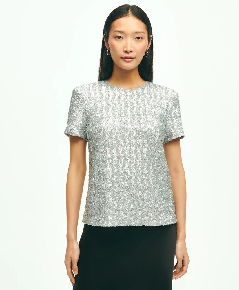 Sparkly Silver Sequin Short Sleeve Top (Category: Blouses) located in Cebu City. Submitted by violacloset (Listing ID 1459492726, Image 2). Description: Measurements: length: 23 1/2 in bust: 19 1/2 in waist: 19 1/2 in the material is stretchable.