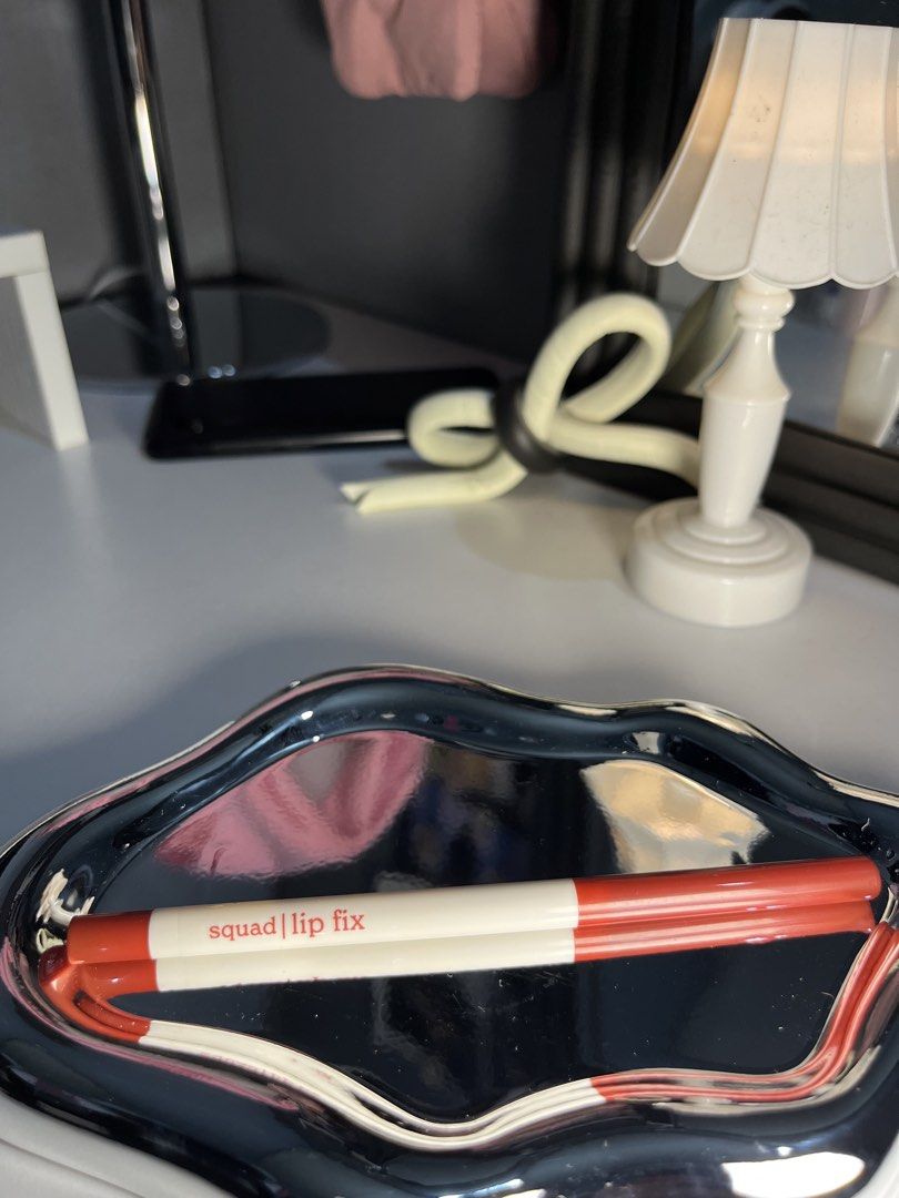 Squad Lip Fix Lip Tint Pencil (Category: Makeup) located in Dasmarinas. Submitted by chesnut97 (Listing ID 1459623307, Image 1). Description: - Squad Lip Fix lip tint in vibrant Red shade. - Unique applicator tip for precise application. - Delivers a beautiful pop of color to your lips. - Effortlessly easy to use, perfect for on-the-go touch-ups. - Achieve that perfect, kissable pout..