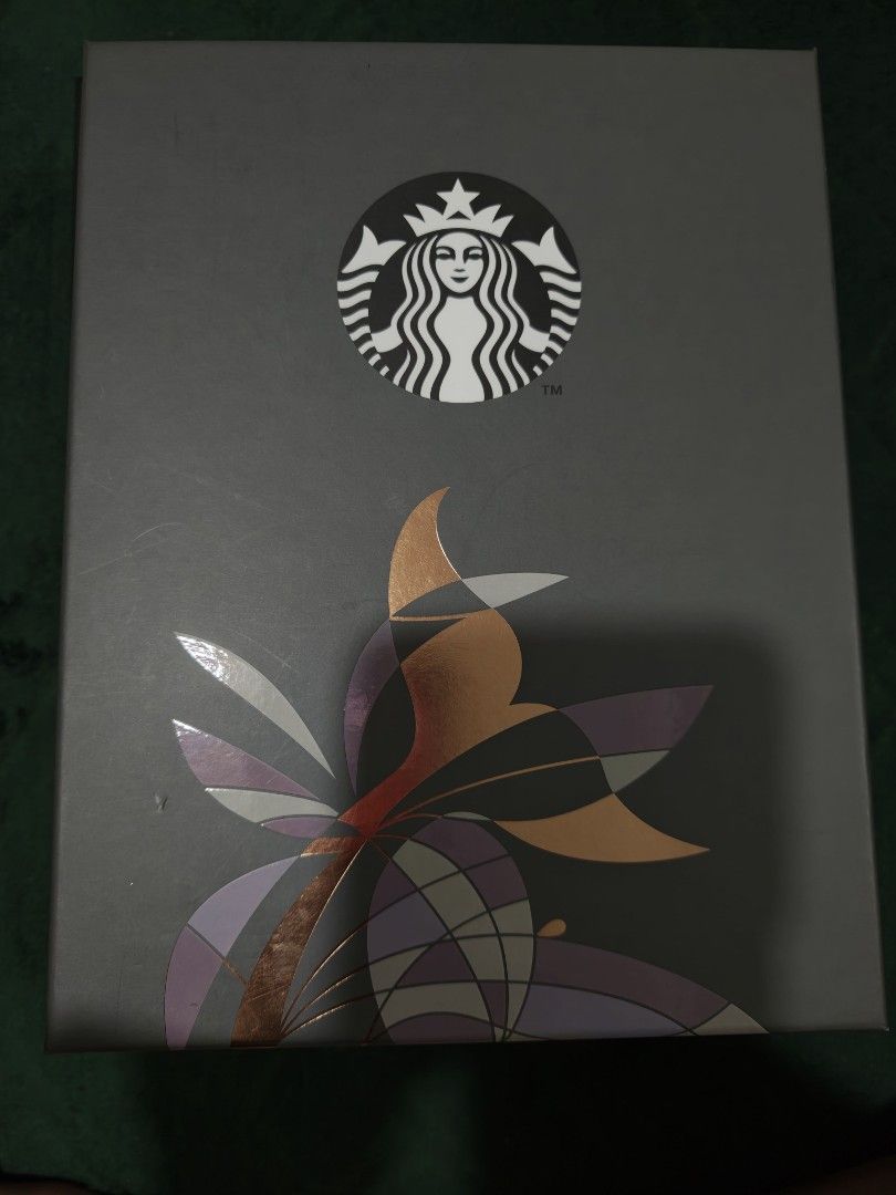 Starbucks Planner (Category: Stationery & School Supplies) located in Pasay City. Submitted by autumn35 (Listing ID 1459656280, Image 2). Description: - Genuine Starbucks Planner - Elegant champagne gold cover with shimmering finish - Features stylish silver ribbon-like accents - Secure snap closure - Comes with its original decorative Starbucks box - Perfect for organizing your schedule and notes .