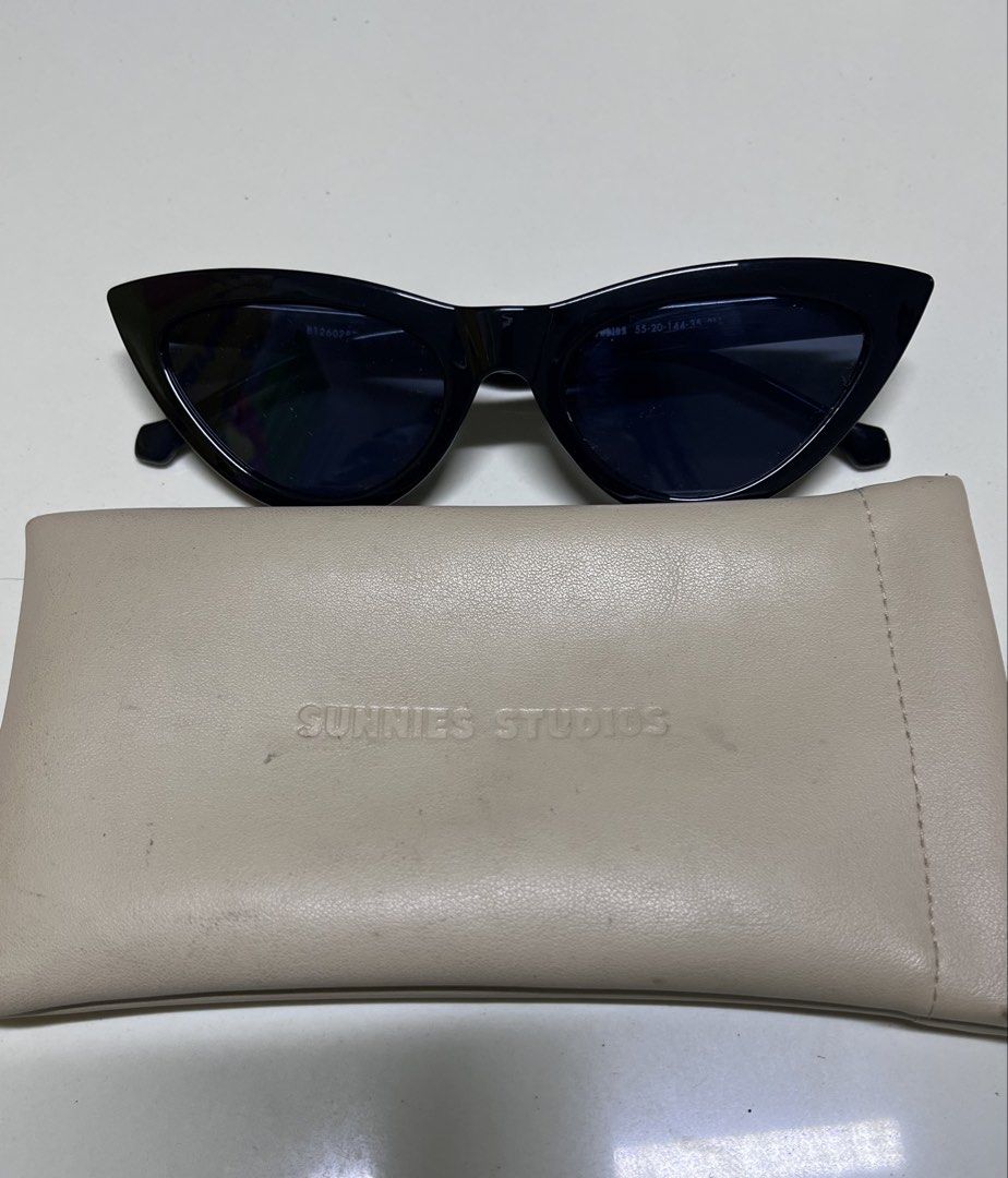 Sunnies Studios Zia Sunglasses - Ink (Category: Sunglasses & Eyewear) located in Paranaque City. Submitted by PrelovedClosetetc (Listing ID 1459630705, Image 2). Description: - Brand: Sunnies Studios - Model: Zia - Style: Cat-eye - Color: Ink - Includes: Soft pouch - Features: Unique shape, great for everyday wear or as a statement accessory.