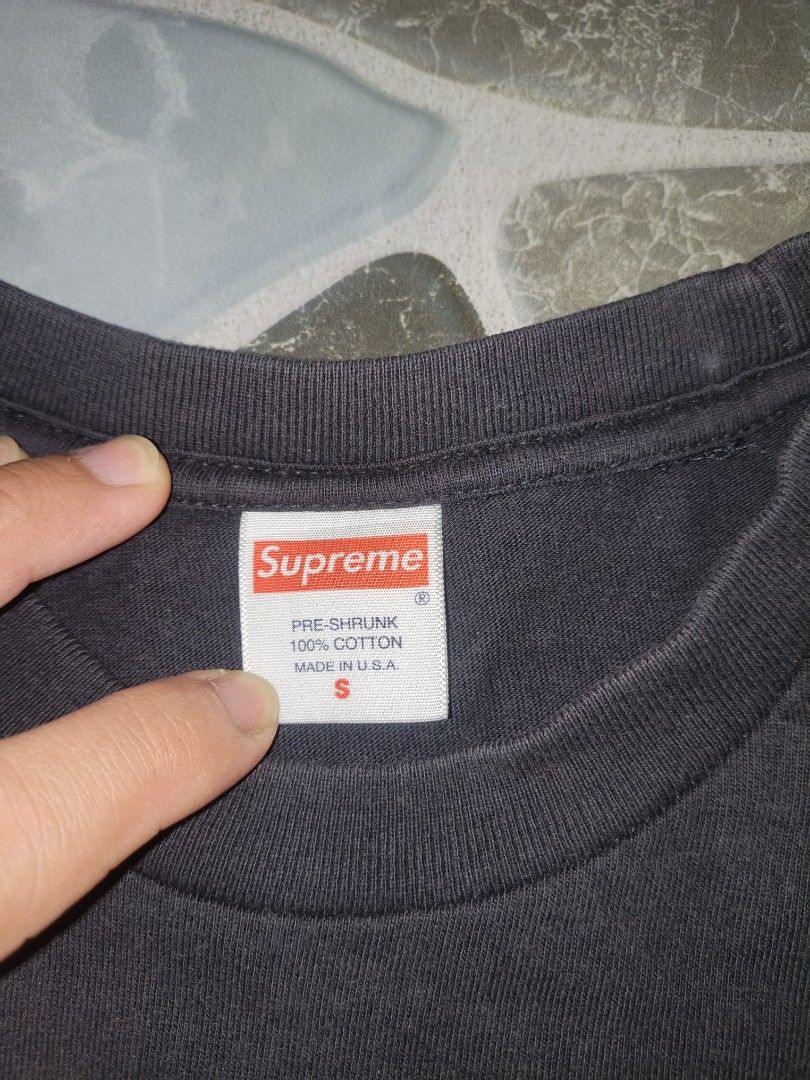 Supreme Graphic T-Shirt Size S (Category: Tshirts & Polo Shirts ) located in Narvacan. Submitted by picky_looter (Listing ID 1459634770, Image 3). Description: - Authentic Black Supreme T-Shirt - Size: S (check measurements in photos) - Material: 100% Pre-shrunk Cotton - Features: Eye-catching graphic print on the front - Style: Ideal for everyday casual wear - Condition: Excellent (refer to actual photos for details).