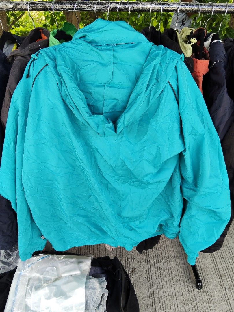 Teal Hooded Zip-Up Jacket (Category: Coats, Jackets and Outerwear) located in Manila. Submitted by whatthethrift696 (Listing ID 1459580577, Image 2). Description: - Lightweight teal jacket - Attached hood - Full zip-up front - Two front pockets - Ideal for layering or as a windbreaker - Perfect for outdoor activities or casual wear - Compact and easy to pack.