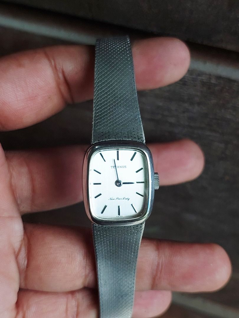 Technos New Star Lady Watch (Category: Women's Watches) located in Batangas. Submitted by vintageanddainty (Listing ID 1459558456, Image 1). Description: - Vintage Technos 'New Star Lady' watch - Classic square face with white dial - Elegant silver mesh strap - Serial number: 7ED629 - Perfect for everyday wear - In good working condition.
