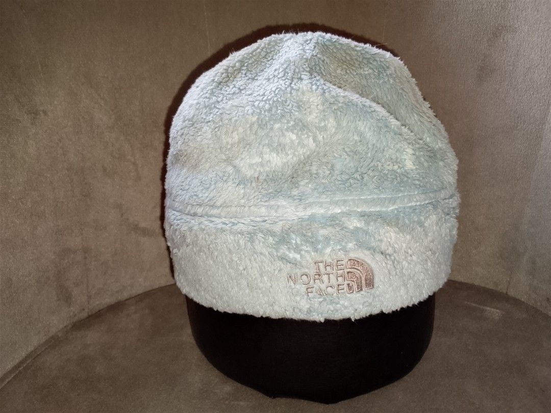 The North Face Beanie (Category: Hats & Beanies) located in Binangonan. Submitted by yuristalin888 (Listing ID 1459575373, Image 3). Description: Stay warm and cozy on chilly days with this light blue fleece beanie from The North Face. Crafted from a plush, fuzzy material for maximum warmth and comfort, it features a folded cuff accented with the brand's signature logo neatly embroidered in silver stitch. Perfect for outdoor adventures or casual 
