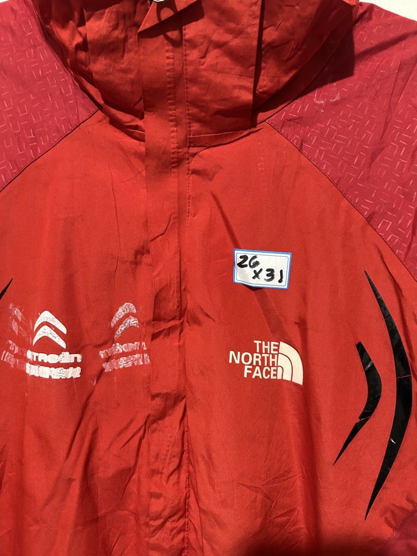 The North Face Summit Series Red Jacket (Category: Coats, Jackets and Outerwear) located in Mandaluyong City. Submitted by 0lg2026 (Listing ID 1459688070, Image 2). Description: - Red The North Face Summit Series jacket - Features North Face logo on front and back - Includes Citroen branding on the front - Equipped with zippered pockets - Ideal for outdoor activities - Tag indicates size 2XL (approximate fit).