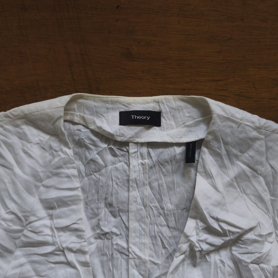 Theory Japan linen blend Coat (Category: Luxury Apparel) located in Tayabas. Submitted by cat.b0i (Listing ID 1459598413, Image 2). Description: Size on tag: 0 Fitting: Men - S Women - S-Semi M ‎Length: 21.5 ‎Width: 17.5 ‎Shoulder: 16 ‎Arm Space: 7.2 ‎Sleeve Length: 21 ‎ ‎Color: Dark blue Color Rate: 9.2 ‎Material: 62% linen, 35% viscose, 3% elastane properties: only overcoat, no clasps or buttons ‎Issues: needs wash ‎Condition: excellent.