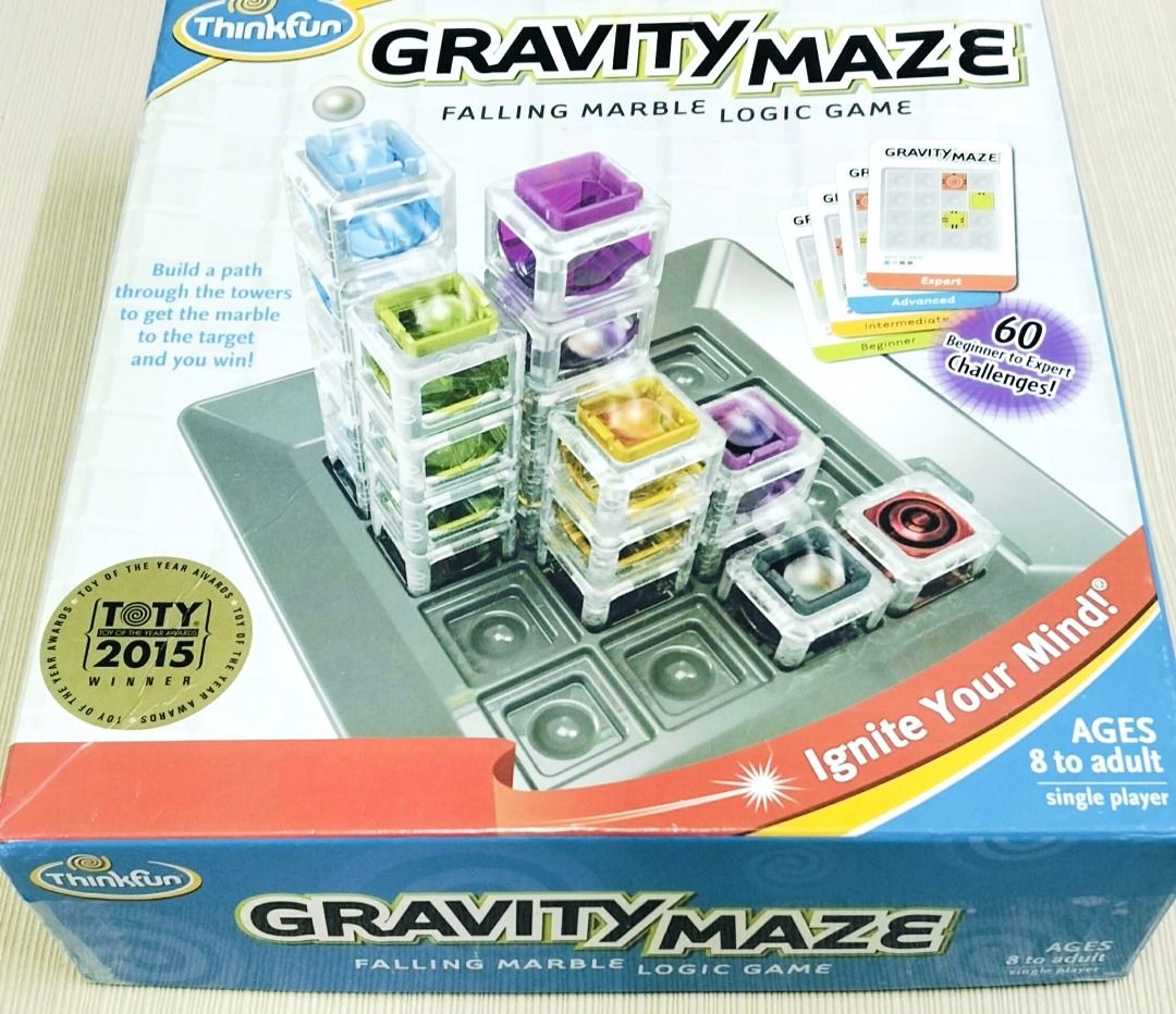 ThinkFun Gravity Maze Falling Marble Logic Game (Category: Board Games & Puzzles) located in Taguig. Submitted by Bloomscorner1 (Listing ID 1459531390, Image 1). Description: - a Think Fun Gravity Maze Logic game to get the marble to the target. - Ignite your mind and tests your reasoning skills. - Build a path through the towers to get the marble to the target - 60 challenges from beginner to expert. - Suitable for ages 8 to adult. - Single play
