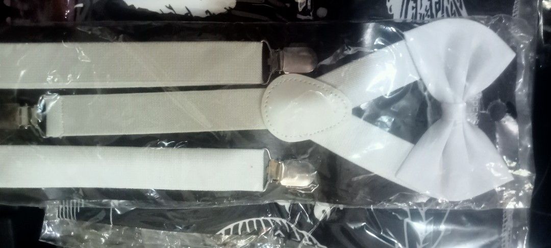 Tie and suspender (Category: Coats, Jackets and Outerwear) located in Paranaque City. Submitted by dimaguilaa94969 (Listing ID 1459547612, Image 1). Description: - White tie and suspender set - Size: XXL (EU 56 / UK 46 / US 46) - Features adjustable suspenders with secure clips pm if int - Includes a pre-tied bow tie for easy styling - Perfect for formal events and special occasions.