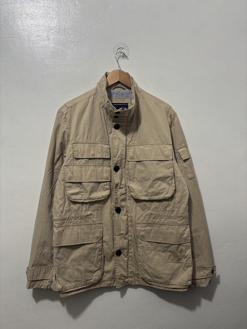 Tommy Hilfiger Beige Trench Coat Men Medium (Category: Coats, Jackets and Outerwear) located in Balanga. Submitted by winterlab_ph (Listing ID 1459598325, Image 2). Description: Code: A800 Width: 22.5 Length: 29.5 Shoulders: 18.5 Sleeves: 27.