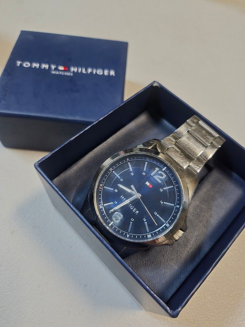 Tommy Hilfiger Men's Watch Blue Dial (Category: Men's Watches) located in Manila. Submitted by oki.ukay (Listing ID 1459617234, Image 2). Description: - Authentic Tommy Hilfiger watch - Stylish blue dial - Durable stainless steel band - Clear time display - Brand new -sizes on the picture -Location: san andres manila.