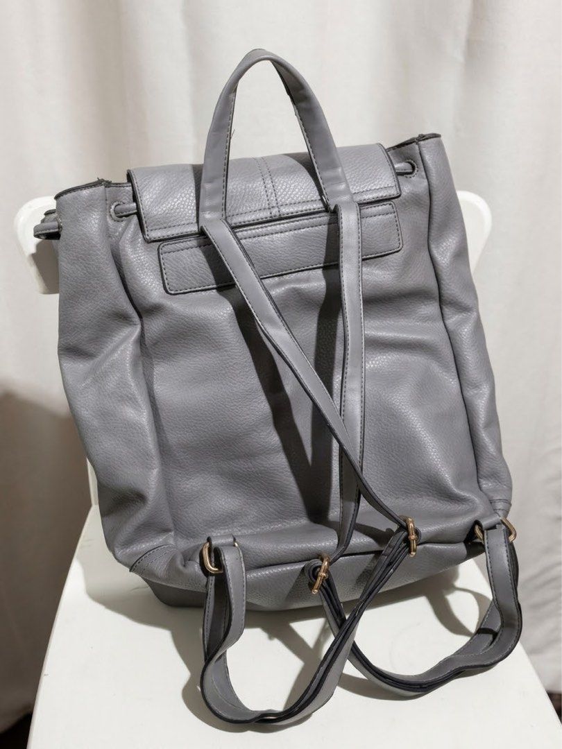 Topshop Gray Leather Backpack (Category: Backpacks) located in Quezon City. Submitted by itsbiancag (Listing ID 1459663772, Image 3). Description: - Original Topshop leather drawstring backpack - Great for school, work or casual days! - Fits my 16” laptop - Super spacious.