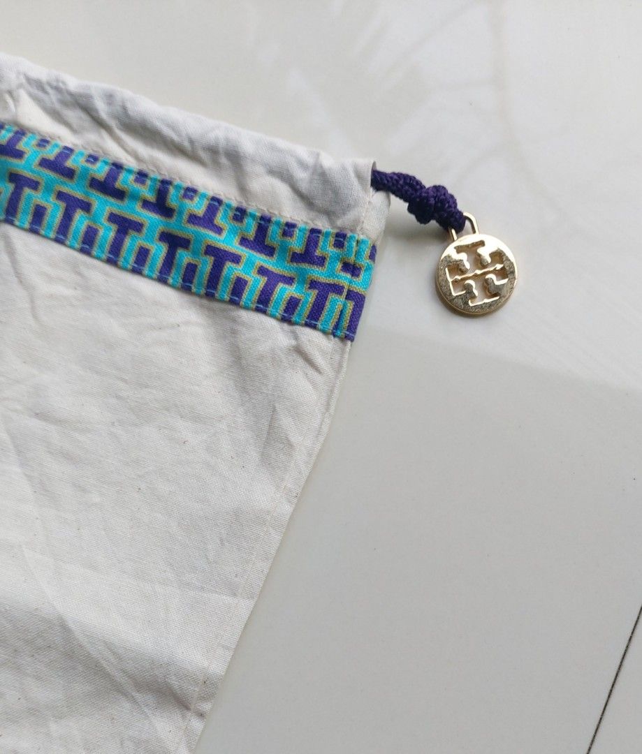 Tory Burch Dust Bag (Category: Luxury Bags & Wallets) located in Lapu Lapu. Submitted by agnesapm_29813 (Listing ID 1459589213, Image 3). Description: - Authentic Tory Burch dust bag - Drawstring closure with gold-tone Tory Burch logo charm - Ideal for storing handbags or shoes - Measurements: width- 12 inches, height-14 inches .