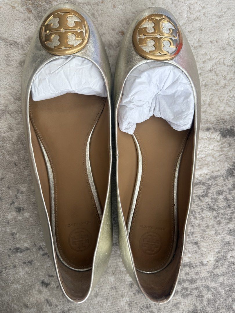Tory burch gold ballet flats 10 Benton (Category: Sneakers & Footwear) located in Makati City. Submitted by nmvs1 (Listing ID 1459506970, Image 3). Description: Tory burch gold Benton ballet flats Size 10 = 27cm sole length Comes with box n dustbag Bought in store Worn in a 2 week trip comfy shoes overall ok With signs of use - scuff as seen on toe tip photo but sole super clean.