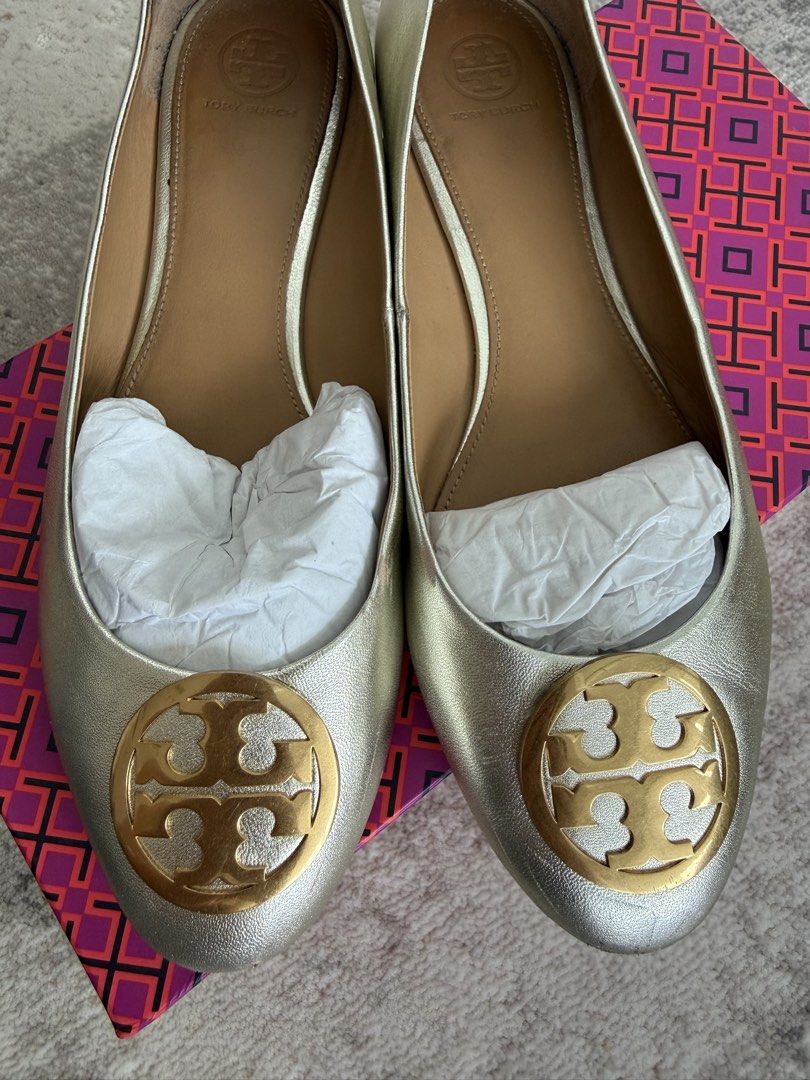 Tory burch gold ballet flats 10 Benton (Category: Sneakers & Footwear) located in Makati City. Submitted by nmvs1 (Listing ID 1459506970, Image 2). Description: Tory burch gold Benton ballet flats Size 10 = 27cm sole length Comes with box n dustbag Bought in store Worn in a 2 week trip comfy shoes overall ok With signs of use - scuff as seen on toe tip photo but sole super clean.