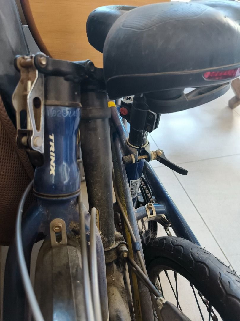 Trinx Bicycle (Foldable) (Category: Bicycles) located in San Leonardo. Submitted by burgossanleonardo.12345 (Listing ID 1459600701, Image 3). Description: - Blue Trinx bicycle - Folding bike style - 10 gears - Padded seat - Tires are dusty but bike is ready for a new owner -twice lang nagamit, halos brand new. Na stock ln sa bahay - 10k original price.