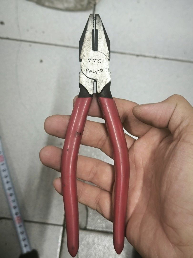 TTC Tsunoda Combination Pliers 175mm (CP-175) (Category: Home Improvement Tools & Accessories) located in Angeles City. Submitted by yellowbrickstore (Listing ID 1459569862, Image 1). Description: Brand: TTC (Tsunoda Co., Ltd.) — Made in Japan Model: CP-175 Size: 175mm / ~7 inches Material: Forged Steel with insulated vinyl handle grips Features: Integrated wire cutter, serrated gripping jaws, and pipe grip section. Condition: Surplus item in goo