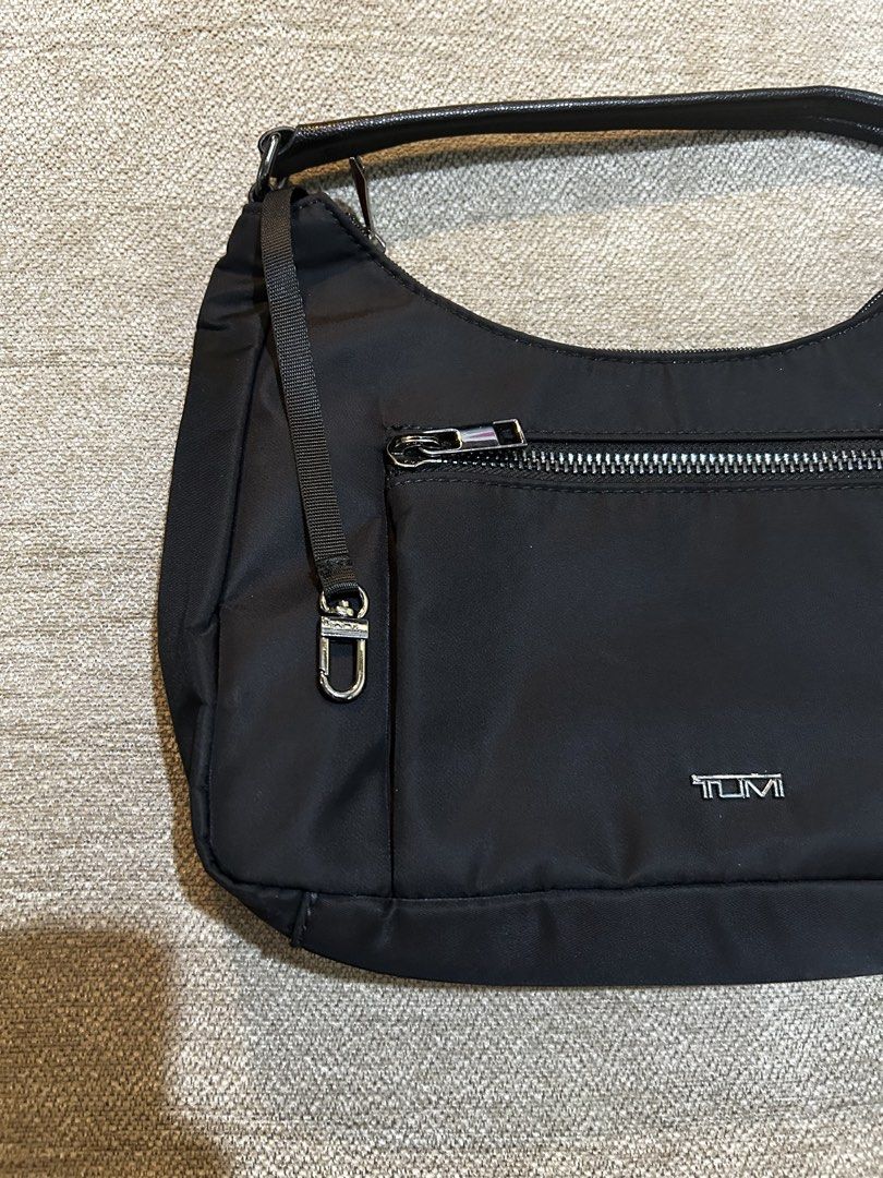 Tumi Adelaide Hobo Bag (Category: Shoulder Bags) located in Aurora. Submitted by purethrift07 (Listing ID 1459613381, Image 3). Description: Ganda nito Walang ka issue2 Like new talaga Dm me fresh from the bale.