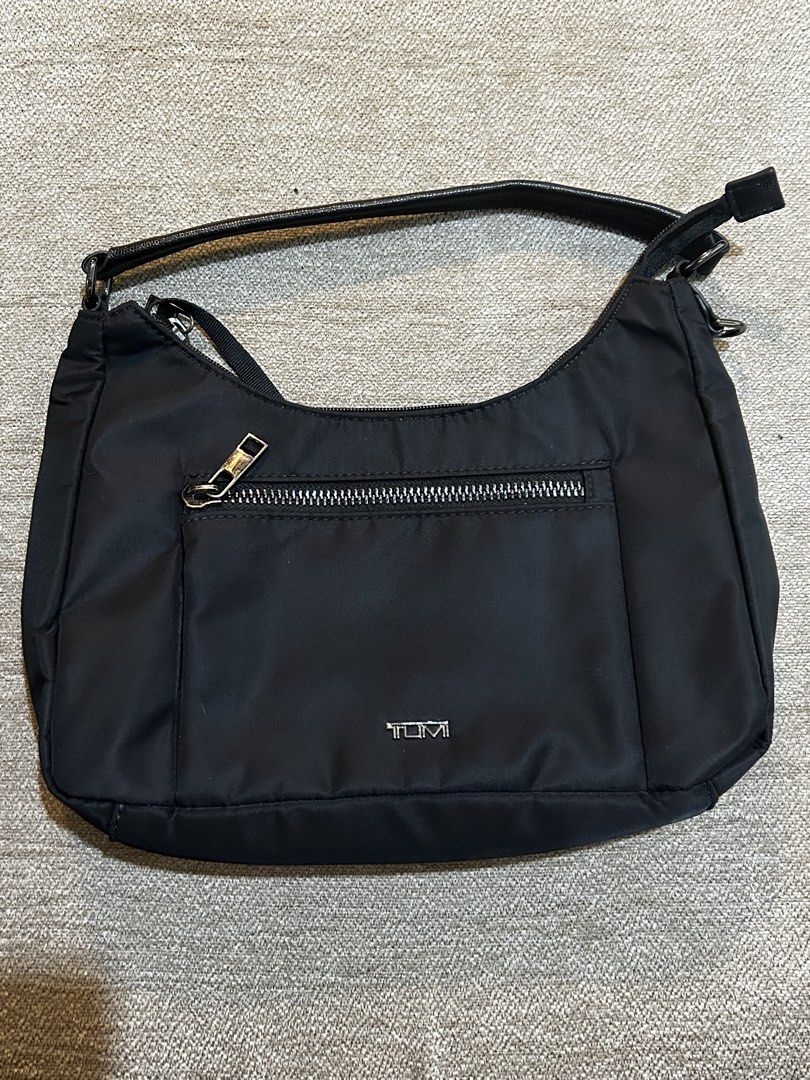 Tumi Adelaide Hobo Bag (Category: Shoulder Bags) located in Aurora. Submitted by purethrift07 (Listing ID 1459613381, Image 1). Description: Ganda nito Walang ka issue2 Like new talaga Dm me fresh from the bale.