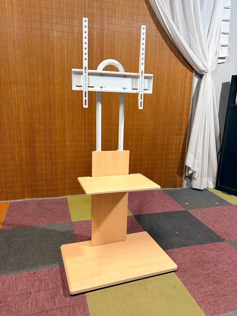 Tv Stand (Category: TV Consoles) located in Meycauayan. Submitted by marygracecasimiro (Listing ID 1459576609, Image 1). Description: Tv Stand / Tv Easel Upto 65inch TV Adjustable Tv height Adjustable Tv Angle 2-Tier Console Shelves Price : 4.5k ✅ In VERY good condition 🩷🧡.