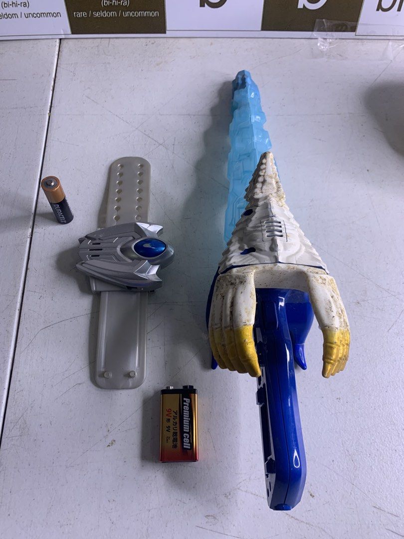 Ultraman Ginga S Shepherdon Saber & DX Band (Category: Action & Battle Toys) located in Carmona. Submitted by bihira (Listing ID 1459525025, Image 1). Description: Ultraman Ginga S Shepherdon Saber & DX Band Ultraman Ginga S Shepherdon Saber & DX Band - WYSIWYG - As is condition / saber no battery cover - Tested Working both lights and sounds ( both items ).