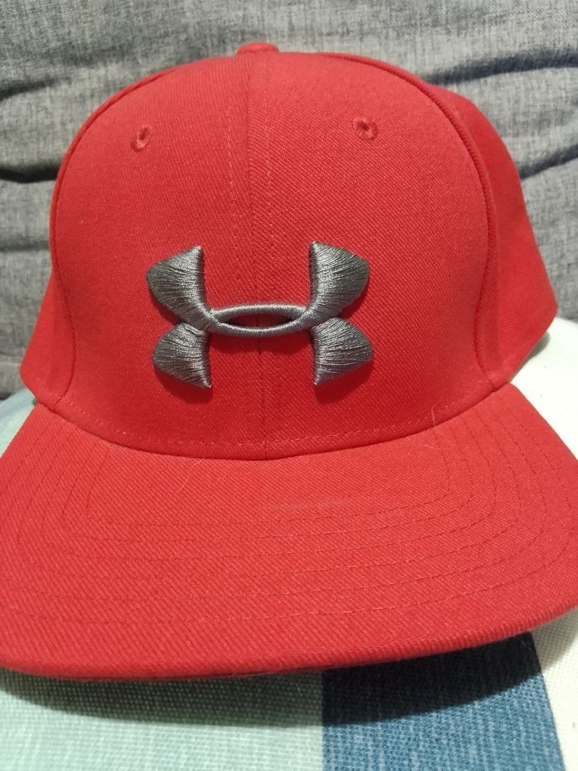 Under Armour Red Snapback Cap (Category: Caps & Hats) located in Manila. Submitted by kiwiboy22 (Listing ID 1459614828, Image 2). Description: Under Armour snapback Legit💯 Good as new 400 only Issue: cut tags San Andres Bukid Manila location.