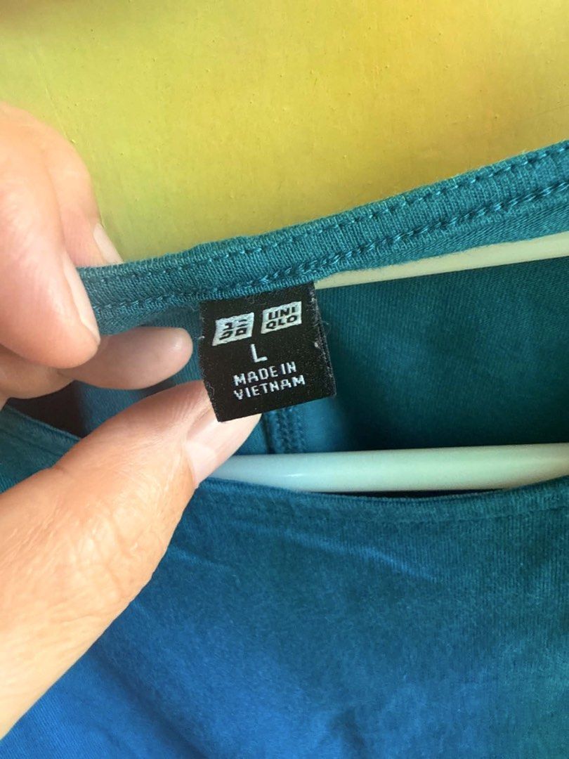 UNIQLO Teal Blouse (Category: Blouses) located in Manila. Submitted by antonettegan (Listing ID 1459611764, Image 3). Description: .
