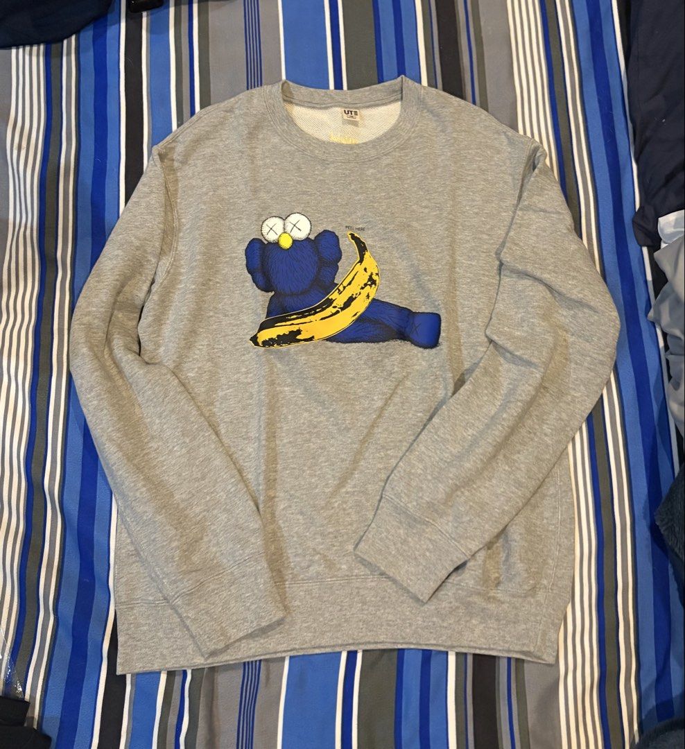 Uniqlo x Kaws Crewneck (Fits Medium) (Category: Coats, Jackets and Outerwear) located in Quezon City. Submitted by danahmaniego (Listing ID 1459602234, Image 1). Description: size 160 teens fits up to medium women in mint condition 21” width 24” length qc area.