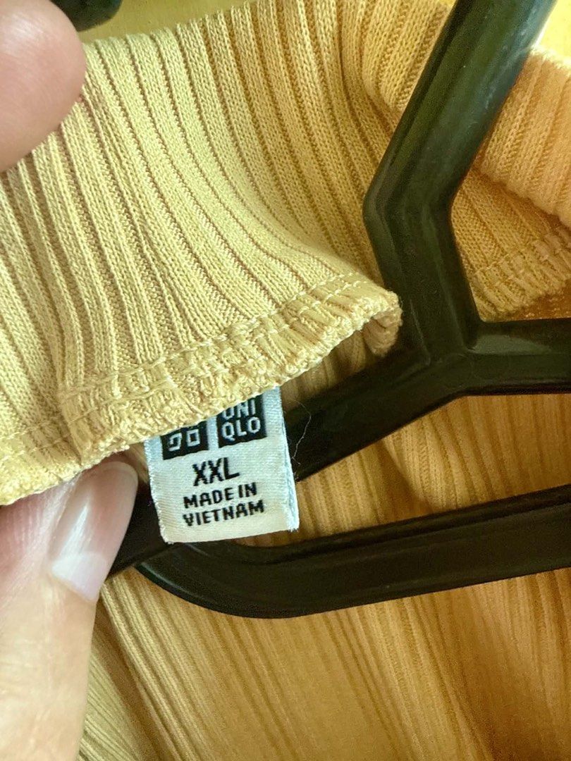 UNIQLO Yellow Mock Neck Blouse (Category: Blouses) located in Manila. Submitted by antonettegan (Listing ID 1459612961, Image 3). Description: .