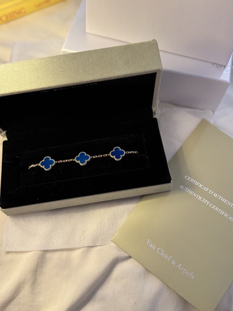 Van Cleef & Arpels Sweet Alhambra Bracelet Blue (Category: Bracelets) located in Davao. Submitted by wear.i.live (Listing ID 1459685951, Image 2). Description: Selling my VCA blue agate bracelet, size 7. Too small for me. Selling very low. - Authentic Van Cleef & Arpels Sweet Alhambra Bracelet - Features three iconic blue clover motifs - Crafted from luxurious 18K gold - Total weight: 10.26g - Comes with original box and authenticity certificate 