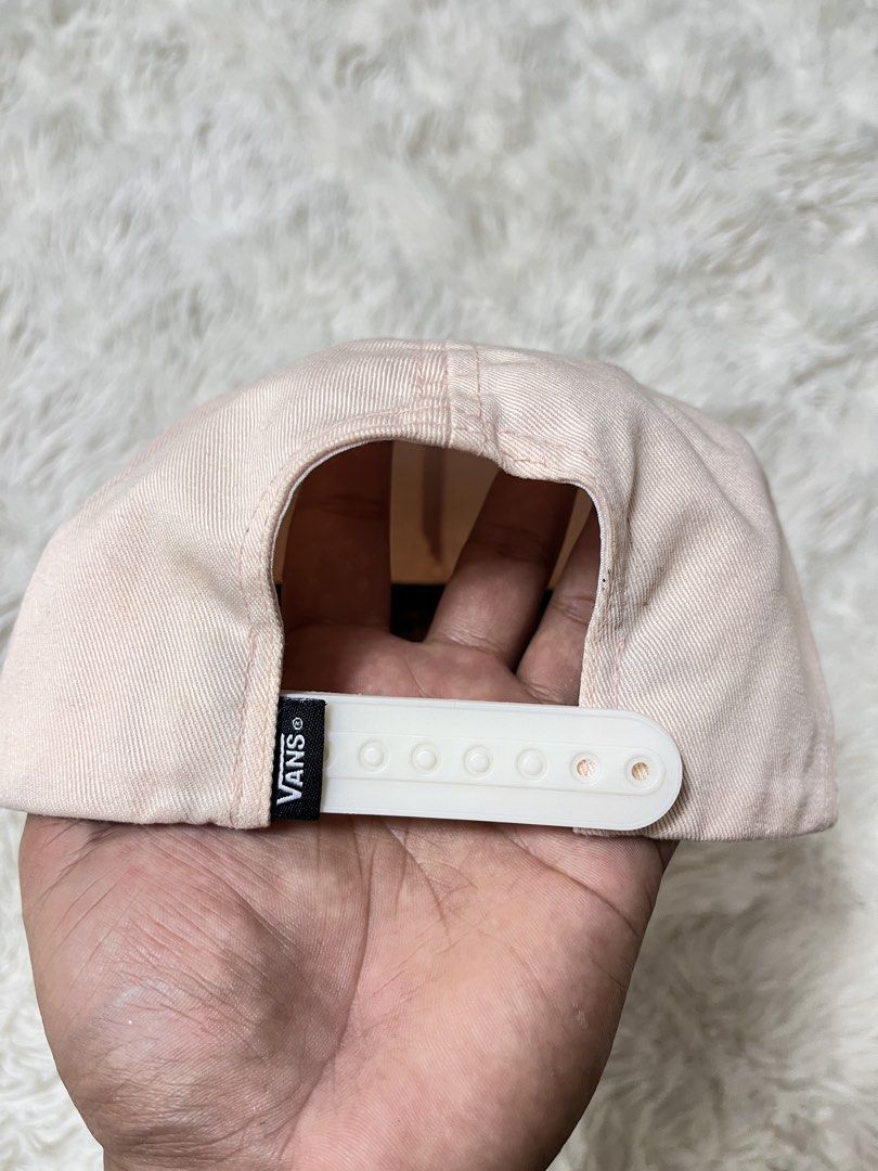 Vans "Off The Wall" Pink Snapback Cap (Category: Caps & Hats) located in General Santos City (Dadiangas). Submitted by crisjayg (Listing ID 1459608475, Image 2). Description: - Pink Vans snapback cap - White embroidered text on the front - Classic Vans logo tag on the back - Adjustable plastic snap closure - Made from 100% cotton - Ideal for everyday wear.