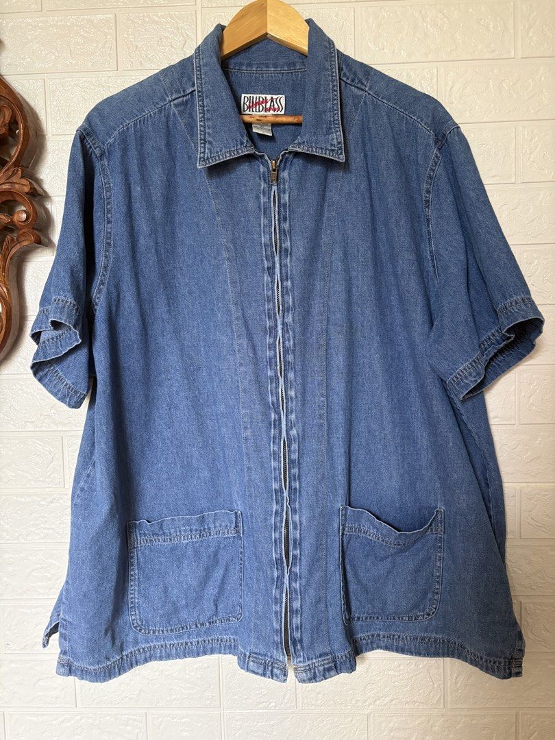Vintage Bill Blass Denim Jacket (Category: Coats, Jackets and Outerwear) located in Batangas. Submitted by purple_and_orange (Listing ID 1459531198, Image 2). Description: - Classic blue denim jacket - Short sleeves with rolled cuff detail - Full zip front closure - Two large front pockets - Collared neckline - Ideal for casual layering.