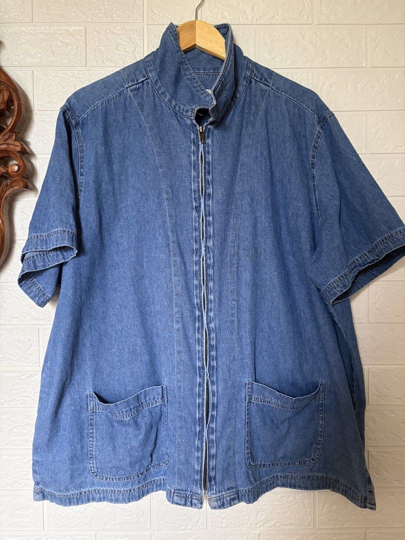 Vintage Bill Blass Denim Jacket (Category: Coats, Jackets and Outerwear) located in Batangas. Submitted by purple_and_orange (Listing ID 1459531198, Image 1). Description: - Classic blue denim jacket - Short sleeves with rolled cuff detail - Full zip front closure - Two large front pockets - Collared neckline - Ideal for casual layering.